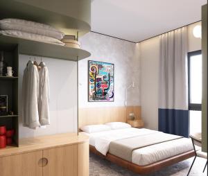 48Old City Hotel في بئر السبع: غرفة نوم بسرير في غرفة
