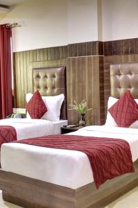 Postel nebo postele na pokoji v ubytování RTS Hotel