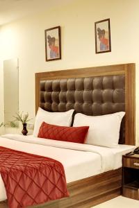 Postel nebo postele na pokoji v ubytování RTS Hotel