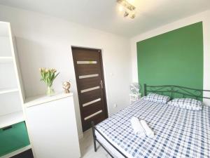 Posteľ alebo postele v izbe v ubytovaní 3rooms-Balcony-PKP - DeerRest Apart