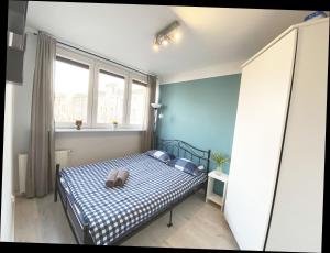 Posteľ alebo postele v izbe v ubytovaní 3rooms-Balcony-PKP - DeerRest Apart