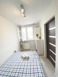 Posteľ alebo postele v izbe v ubytovaní 3rooms-Balcony-PKP - DeerRest Apart