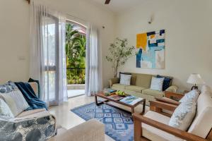 Гостиная зона в Aguada Anchorage - The Villa Resort, Candolim