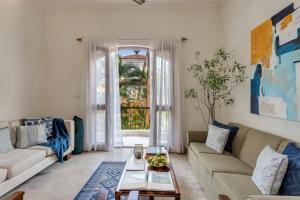 Гостиная зона в Aguada Anchorage - The Villa Resort, Candolim
