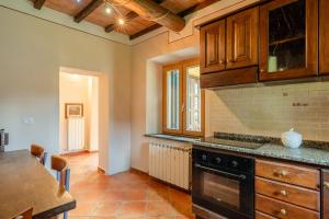 Virtuvė arba virtuvėlė apgyvendinimo įstaigoje Relais in spa La grotta del Vento