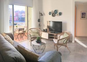 TV a/nebo společenská místnost v ubytování Balcon de la Aurora