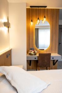 Postel nebo postele na pokoji v ubytování Aktas Hotel