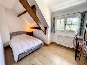 Posteľ alebo postele v izbe v ubytovaní Maison avec Terrasse à 100m de la Plage, Jardin Clos, 3 Chambres, Proche Mont Saint-Michel - FR-1-361-457