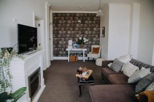 Χώρος καθιστικού στο Postmasters Apartment Motueka