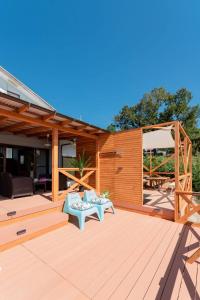a wooden deck with a bench and a gazebo at VIVA SUMOTO - Vacation STAY 81374v in Amakusa