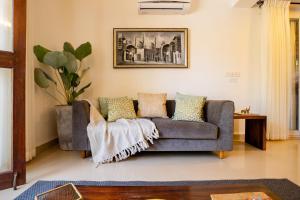 Гостиная зона в Aguada Anchorage - The Villa Resort, Candolim