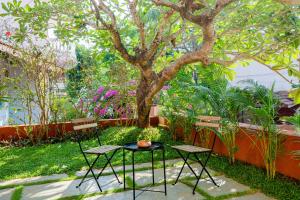 Сад в Aguada Anchorage - The Villa Resort, Candolim