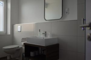 Koupelna v ubytování Hotel Milano