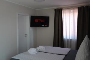 Postel nebo postele na pokoji v ubytování Hotel Milano