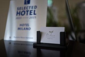 Certifikát, hodnocení, plakát nebo jiný dokument vystavený v ubytování Hotel Milano