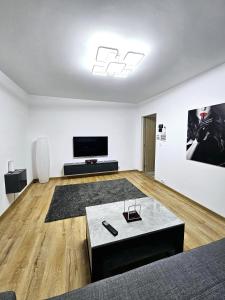 TV a/nebo společenská místnost v ubytování Casa Darius 2