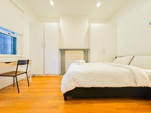 Una cama o camas en una habitación de Ultimo Terrace Homestay