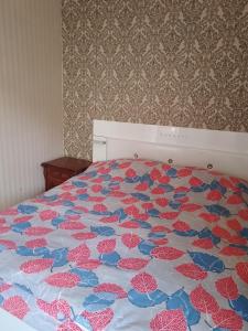 Rúm í herbergi á Tamuna Guest House
