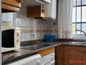 Kuchyň nebo kuchyňský kout v ubytování Escapada Marina