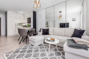 Χώρος καθιστικού στο Ekskluzywne Apartamenty "Na Wydmach" Międzywodzie by Noclegi Renters