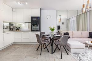 Η κουζίνα ή μικρή κουζίνα στο Ekskluzywne Apartamenty "Na Wydmach" Międzywodzie by Noclegi Renters