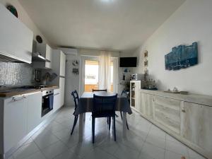 Kuchyň nebo kuchyňský kout v ubytování Maison Admas