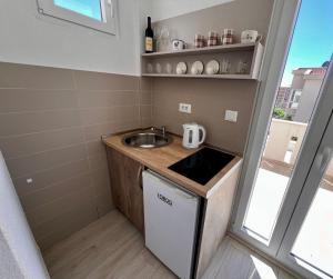 Kuchyň nebo kuchyňský kout v ubytování Guesthouse Civovic