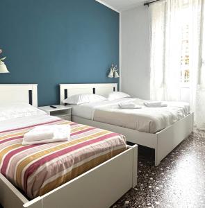 Postel nebo postele na pokoji v ubytování Hotel Baia di Levanto