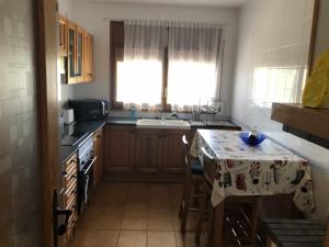 A kitchen or kitchenette at Casa Bellavista con piscina en Caldes Costa Brava