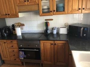 A kitchen or kitchenette at Casa Bellavista con piscina en Caldes Costa Brava