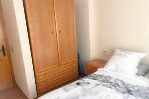 A bed or beds in a room at Casa Bellavista con piscina en Caldes Costa Brava