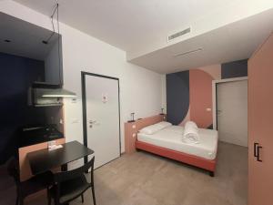 Postel nebo postele na pokoji v ubytování Arqué Apartments - Arco Centro + 20 fotografií