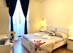 Postel nebo postele na pokoji v ubytování Hotel Baia di Levanto