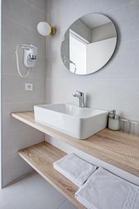 Koupelna v ubytování Hotel Centre Plage