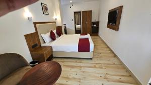 Ένα ή περισσότερα κρεβάτια σε δωμάτιο στο INDIANA HILLS