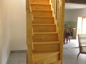 a set of stairs in a house at Spacious Cottage with Private Garden in Normandy in Le Bourg-Dun