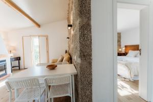 Ένα ή περισσότερα κρεβάτια σε δωμάτιο στο Quinta de S. Miguel