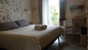 Posteľ alebo postele v izbe v ubytovaní Maison d'hôtes KerCalow, Chambres d'hôtes