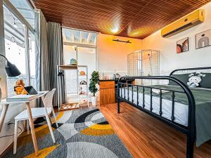 Postel nebo postele na pokoji v ubytování La Casa Di Dicembre HCMC