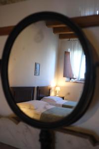 Postel nebo postele na pokoji v ubytování Agriturismo Corte Pellegrini