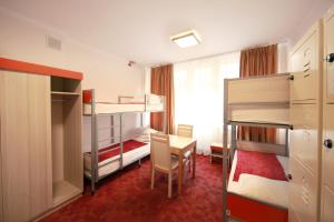 Postel nebo postele na pokoji v ubytování eMKa Hostel