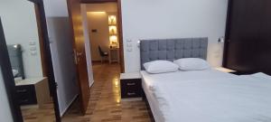 Postel nebo postele na pokoji v ubytování Sadam Luxury apartment