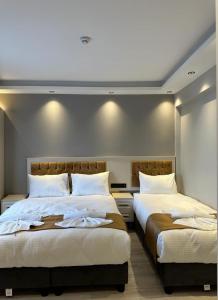 Postel nebo postele na pokoji v ubytování Sareban Hotel Istanbul + 20 fotografií