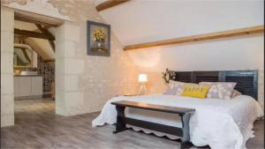 Ein Bett oder Betten in einem Zimmer der Unterkunft La Vigenna