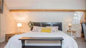 Ein Bett oder Betten in einem Zimmer der Unterkunft La Vigenna