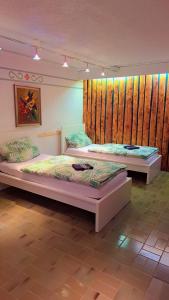 En eller flere senge i et værelse på Monteurzimmer, Monteurunterkunft in 20 km von Hanau und 35 km von Frankfurt am main