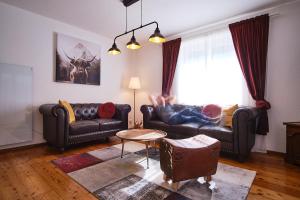 Posezení v ubytování Appartements Das Charlie