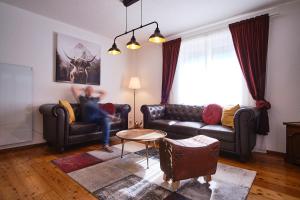 Posezení v ubytování Appartements Das Charlie