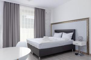 Posteľ alebo postele v izbe v ubytovaní Ovo Chic Studio