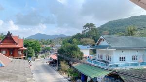 a view of a town with buildings and a street at Amazing Inn Koh Tao in Koh Tao